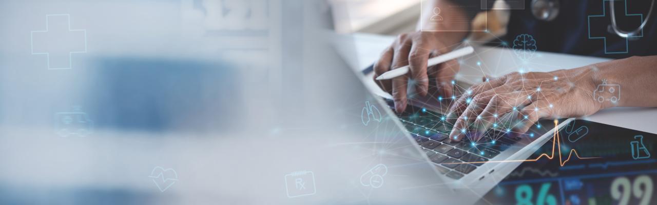 health care professional typing at laptop with graphics of brain, heart monitor, numbers